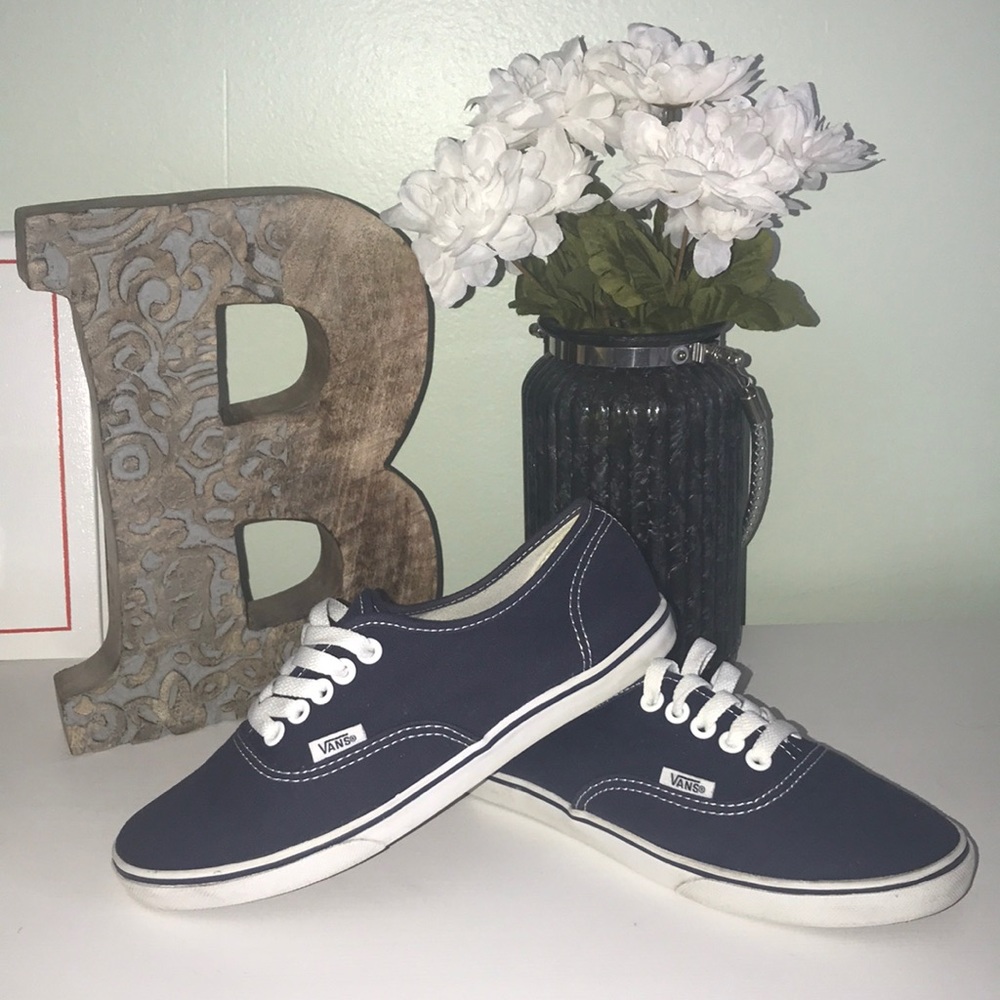 Navy blue Vans “off the wall”